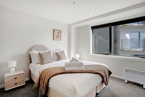 The Queen bedroom has neutral colours which invites a restful sleep.