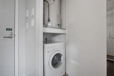 There is a combo washer/dryer that is useful for any long-term stays.