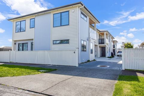 The townhouse is part of a row of townhouses.