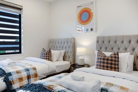 The beds have matching throws and cushions providing a restful colour scheme.