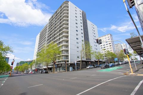 View of the apartment building from the street.