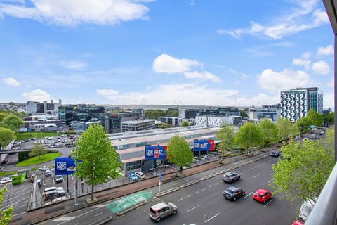 There are views over to the harbour and the city from the apartment balcony.