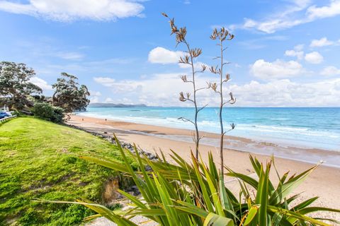 Walk to the beach to see the stunning scenery that Red Beach offers.