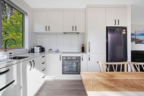 The kitchen has everything you need to create meals including a cook top and oven.