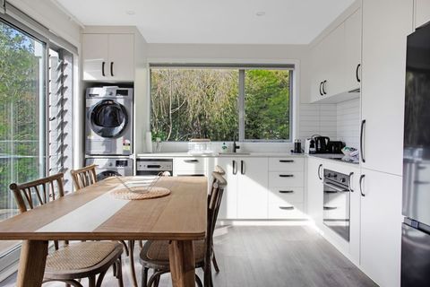 The open-plan space includes the kitchen and dining area.