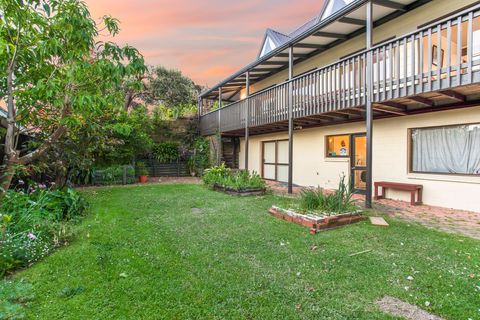 The backyard is fully fenced and is great for the children to play on.