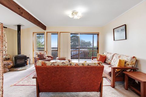 The living room is set-up perfectly for conversation or to enjoy the view.