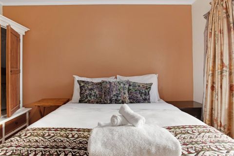 There is plenty of storage in the double wardrobe for all your personal belongings.