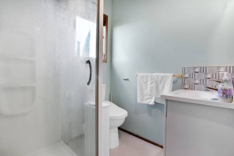 There is another family bathroom with shower, bidet toilet and vanity unit.