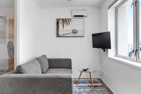 Relax on the couch and watch TV or read a book.