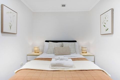 The colourful throw adds some colour to the neutral colour scheme.