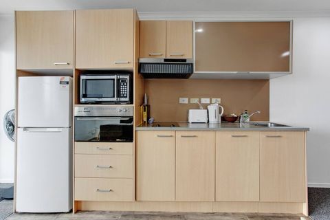 The kitchen has plenty of storage if you want to stay longer.