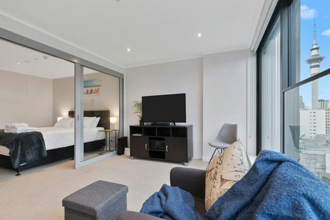 Enjoy the view from the window of the Sky Tower and the city skyline.