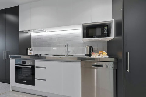 The kitchen has plenty of storage if you want to stay longer.