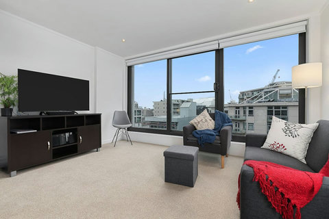 Relax on the couch and watch TV or read a book.