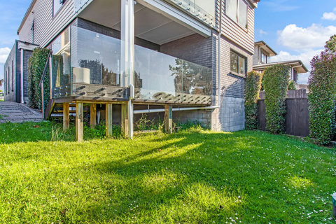 There is a backyard that is accessible from the deck and would be great for games or a picnic.