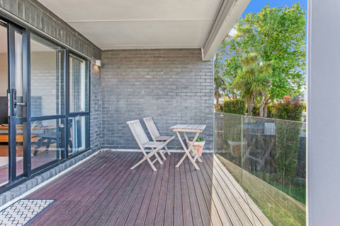 Take a seat outside on the deck and enjoy the summer days.