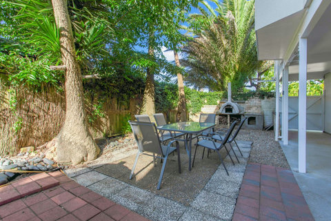 On the ground floor, there is another outside seating area complete with pizza oven.