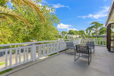 The balcony is a lovely place to sit on a warm summers day.