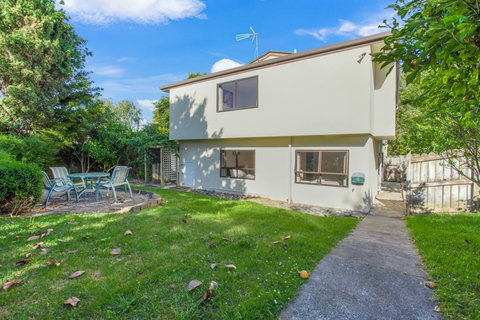 The backyard is a great place for the children to play and there is extra seating that you can be used to watch them.