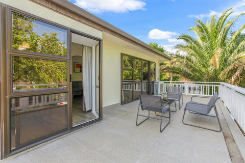 There is easy access to the dining room and kitchen through the single ranch slider.