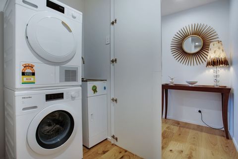 There is a handy washer and dryer hidden in the hallway cupboard.