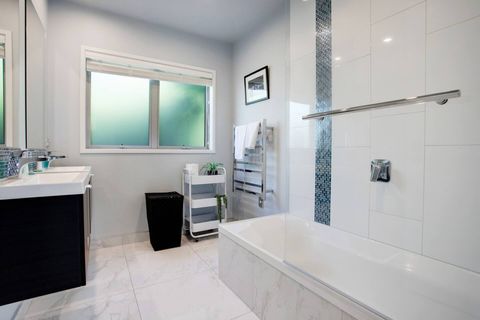 In the main family bathroom, the shower is over a bathtub so you can enjoy either a quick shower or a luxurious bath.