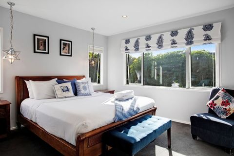 The King bed has an air of elegance with the matching wooden furniture and headboard.