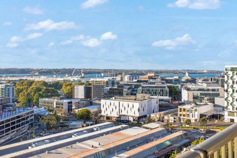 There are views over to the harbour and the city from the apartment balcony.