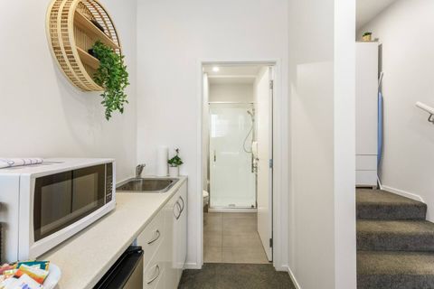 The kitchenette has a microwave and beer fridge.