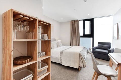 The shelving unit is great for extra storage including the wine glasses and mugs.