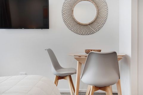 The dining table is a great place to eat together or play cards.