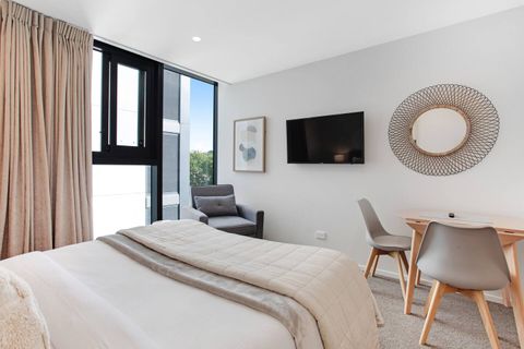 The apartment has a neutral colour scheme that invites relaxation.