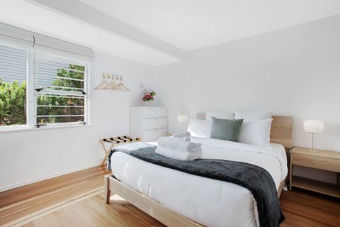 The dresser and luggage rack are useful in the main bedroom to store your belongings off the floor.