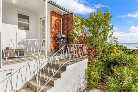 There are stairs to walk down from the balcony area into the backyard.