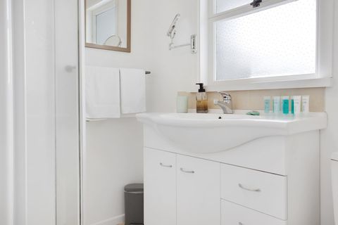 There is plenty of storage in the bathroom for all your personal belongings.