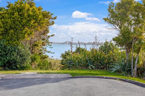 At the end of the road, there are a couple of pathways down to the water's edge and a picnic table.