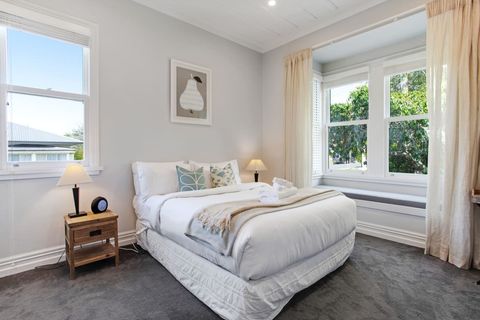 The lovely bay window would make for a perfect reading spot.