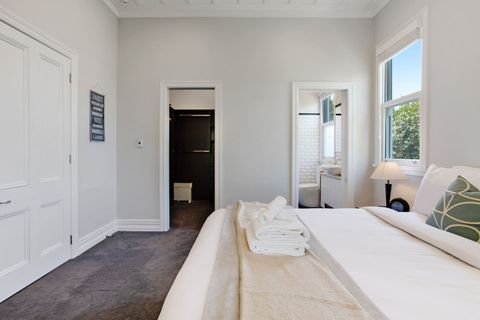 The Queen bedroom has a walk-in wardrobe and ensuite bathroom.