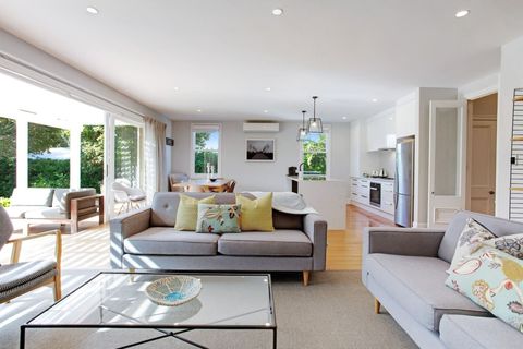 The open plan living space includes the kitchen, dining and living room area.