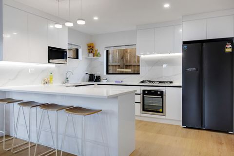 There is casual bar seating at the kitchen island which is great for breakfast or to have the kids helping prepare dinner.