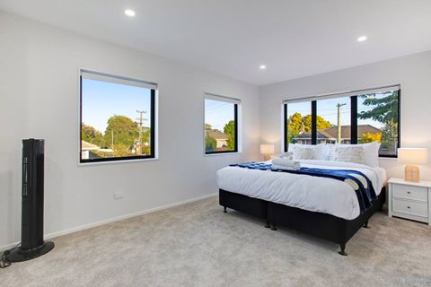 There is plenty of natural light that streams into the bedroom through the multiple windows.