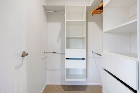 There is plenty of storage in the walk-in wardrobe.