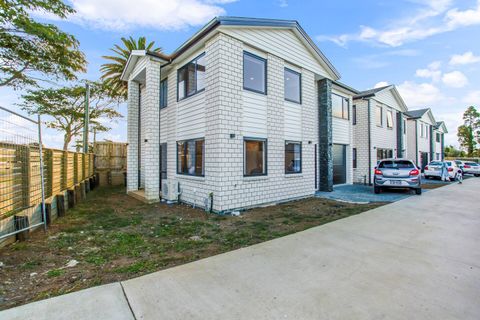The townhouse is set amongst other townhouses.