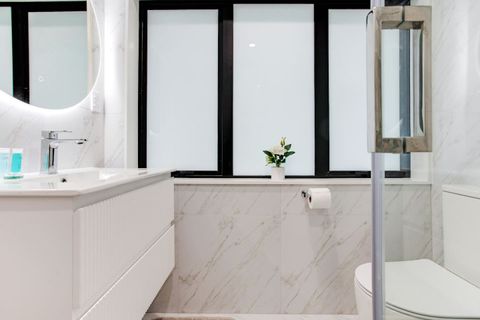 There is plenty of space on the vanity for your personal belongings.