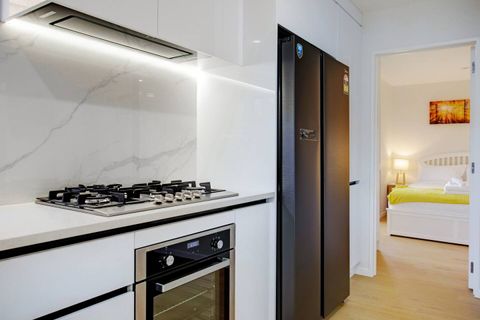 The gas cooktop and oven makes cooking family meals a breeze.