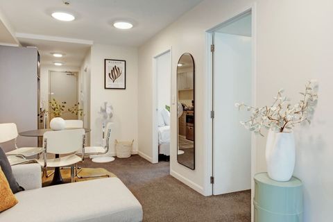 The bedrooms are located off the living spaces.