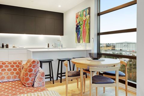 There is seating at the kitchen island bench which is great for breakfast dining.