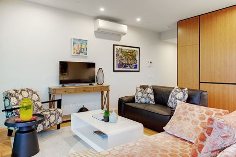 Relax on the couch and watch TV or read a book.