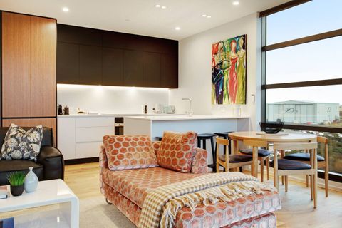 Put your feet up on the day bed and enjoy the view out over the bay.